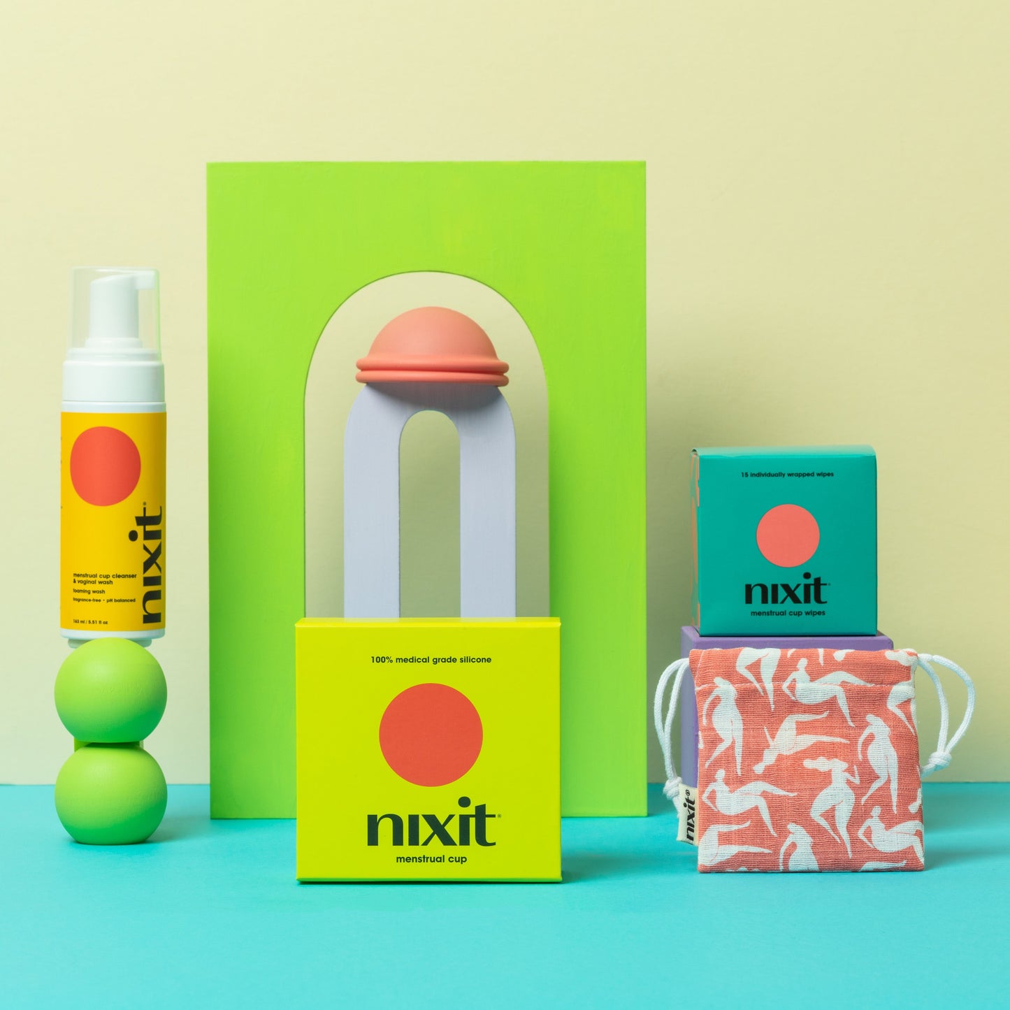 Photo of nixit menstrual cup, carrying bag, nix wash, nixit wipes for period cup care on the go. 