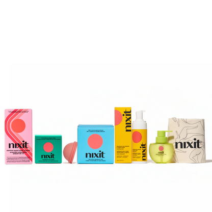 Assorted nixit menstrual products including reusable menstrual discs and eco-friendly packaging, arranged in a line against a white background.