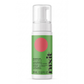 Nixi personal wash bottle with green label and white pump on a white background